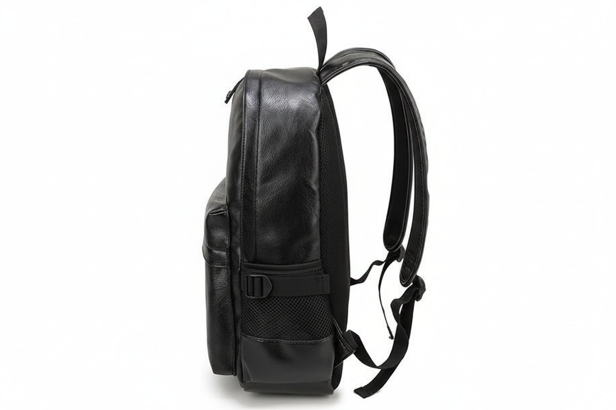 Black leather backpack on a white background