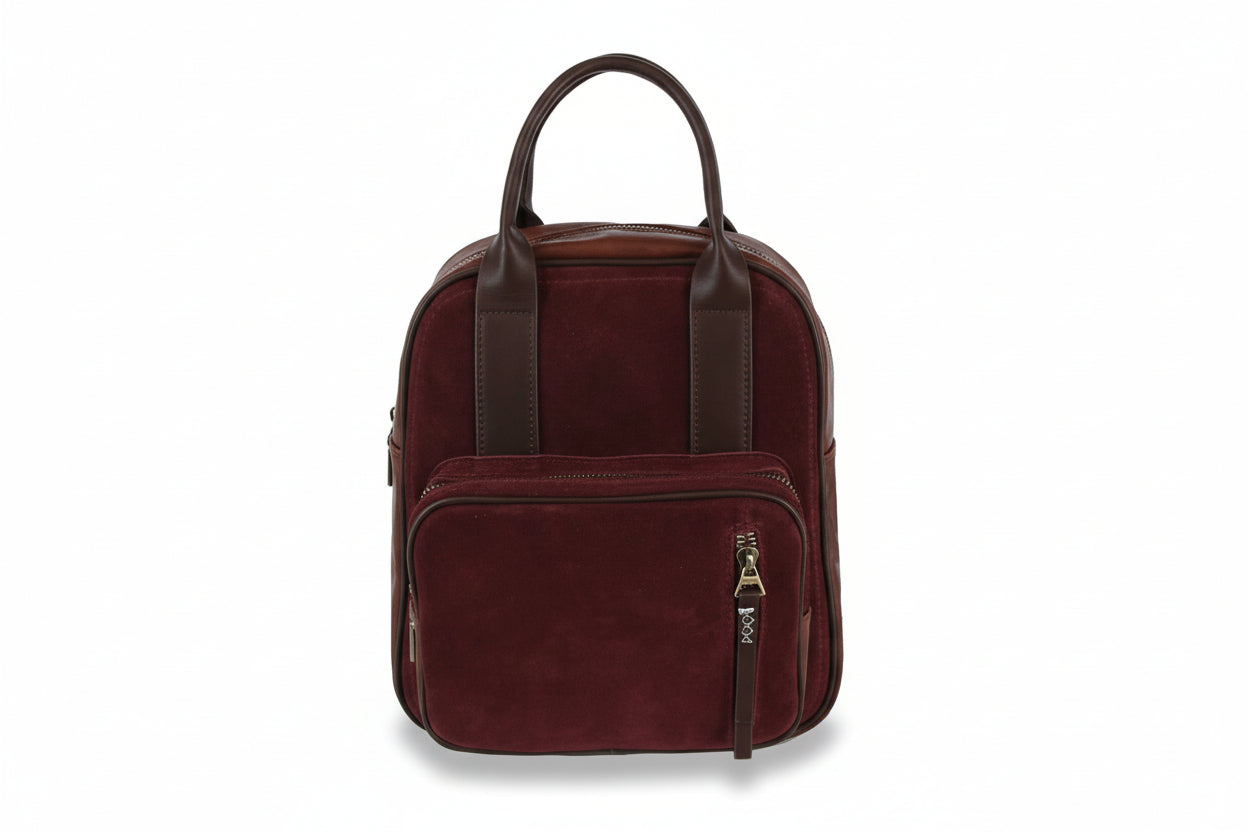 Burgundy leather backpack on a white background