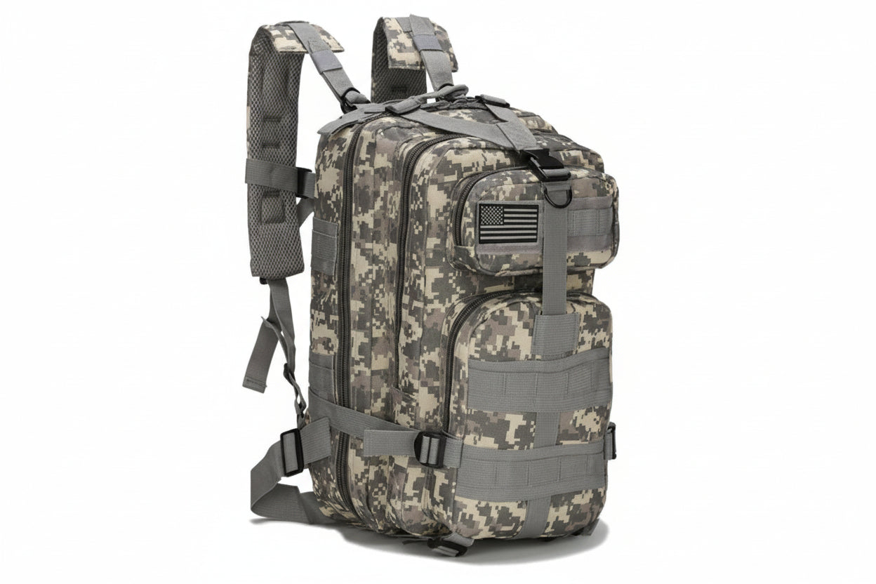 Camouflage backpack with American flag patch on a white background