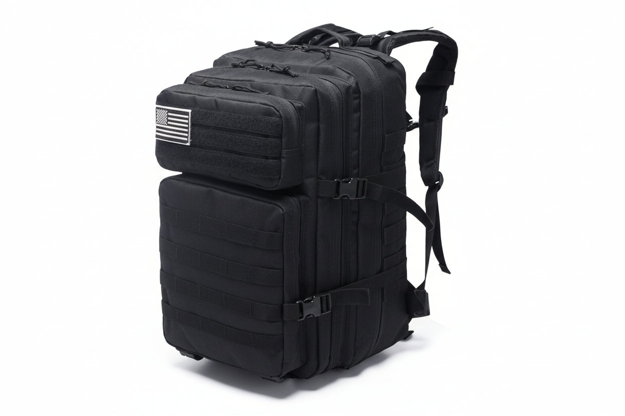 Black tactical backpack with American flag patch on a white background