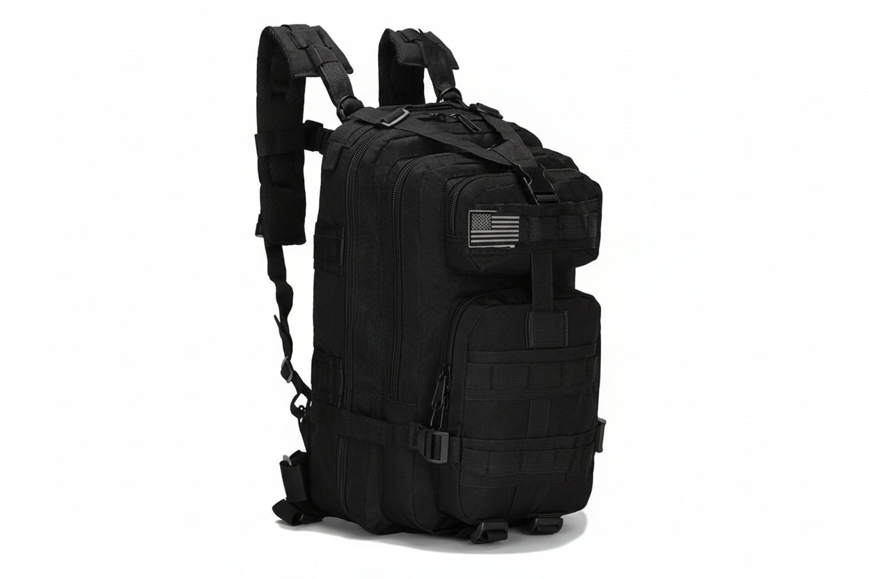 Black tactical backpack with American flag patch on a white background