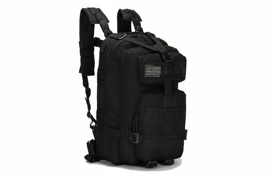 Black tactical backpack with American flag patch on a white background