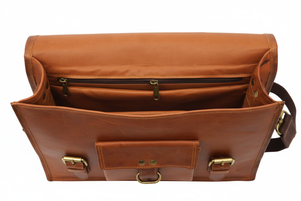 Brown leather bag with gold hardware on a white background