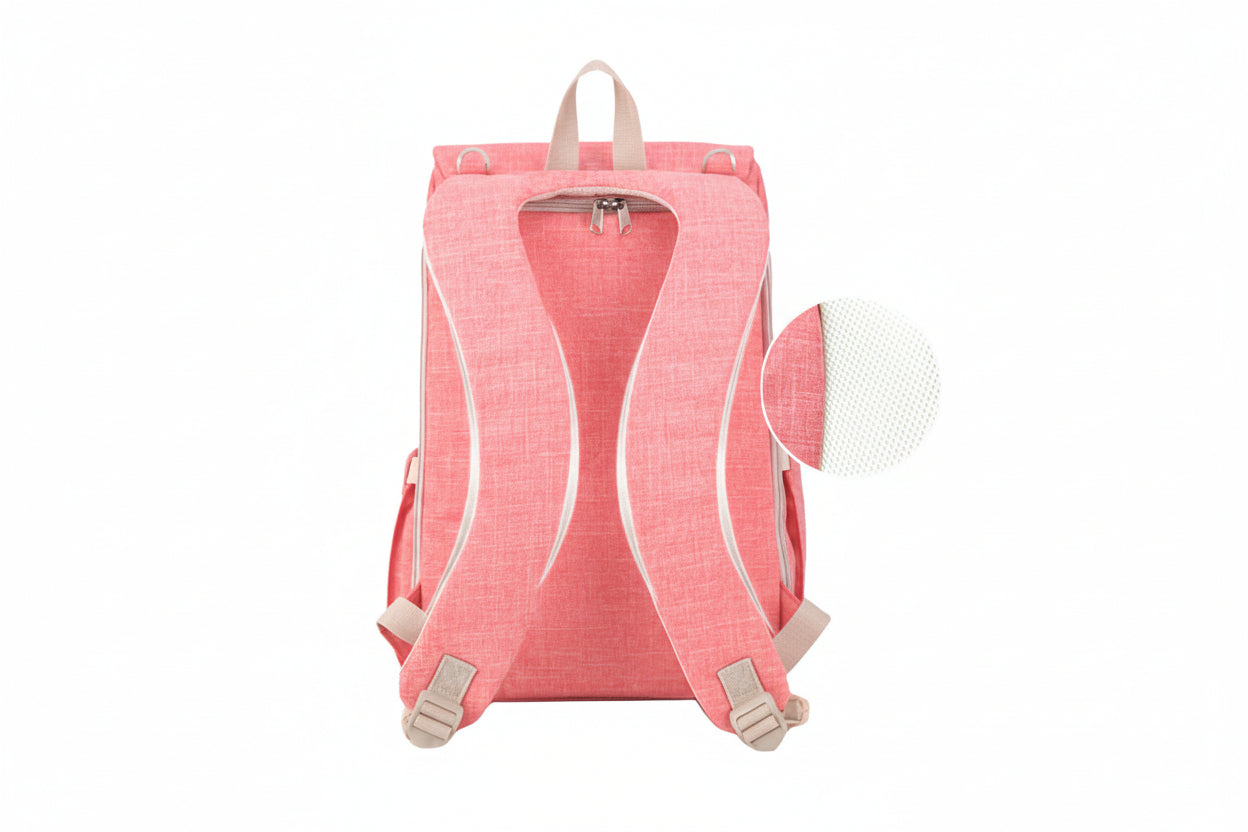 Pink backpack with beige straps on a white background