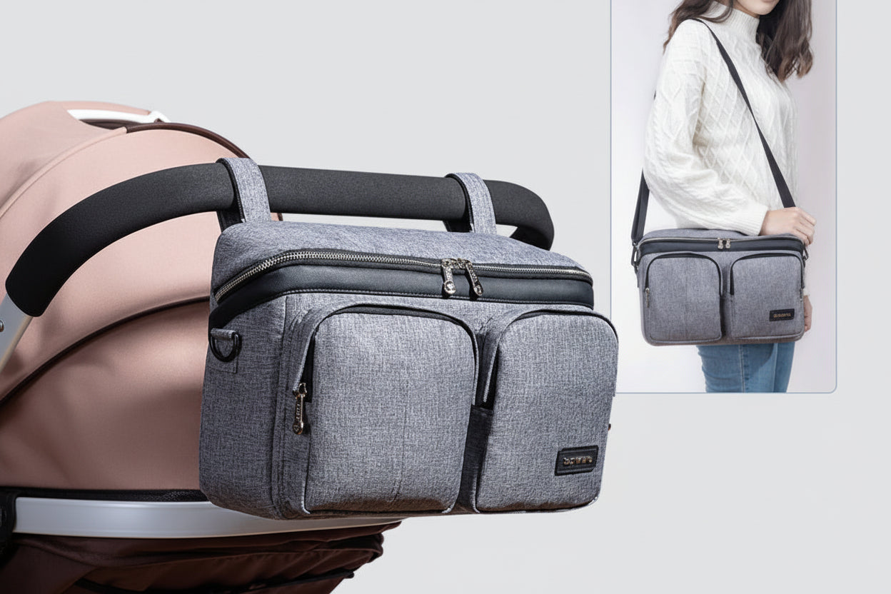 Gray diaper bag attached to a stroller with a smaller inset showing a person carrying the bag.