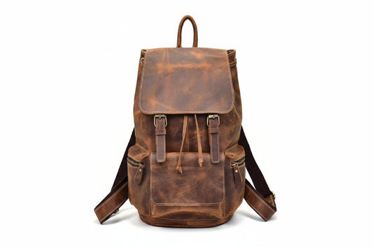 Brown leather backpack on a white background